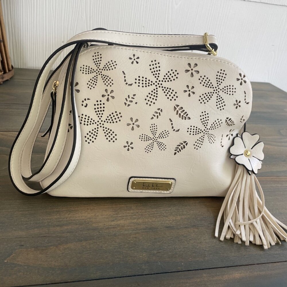 Nicole Miller Ivory Floral Cutout Crossbody with Tassel Charm